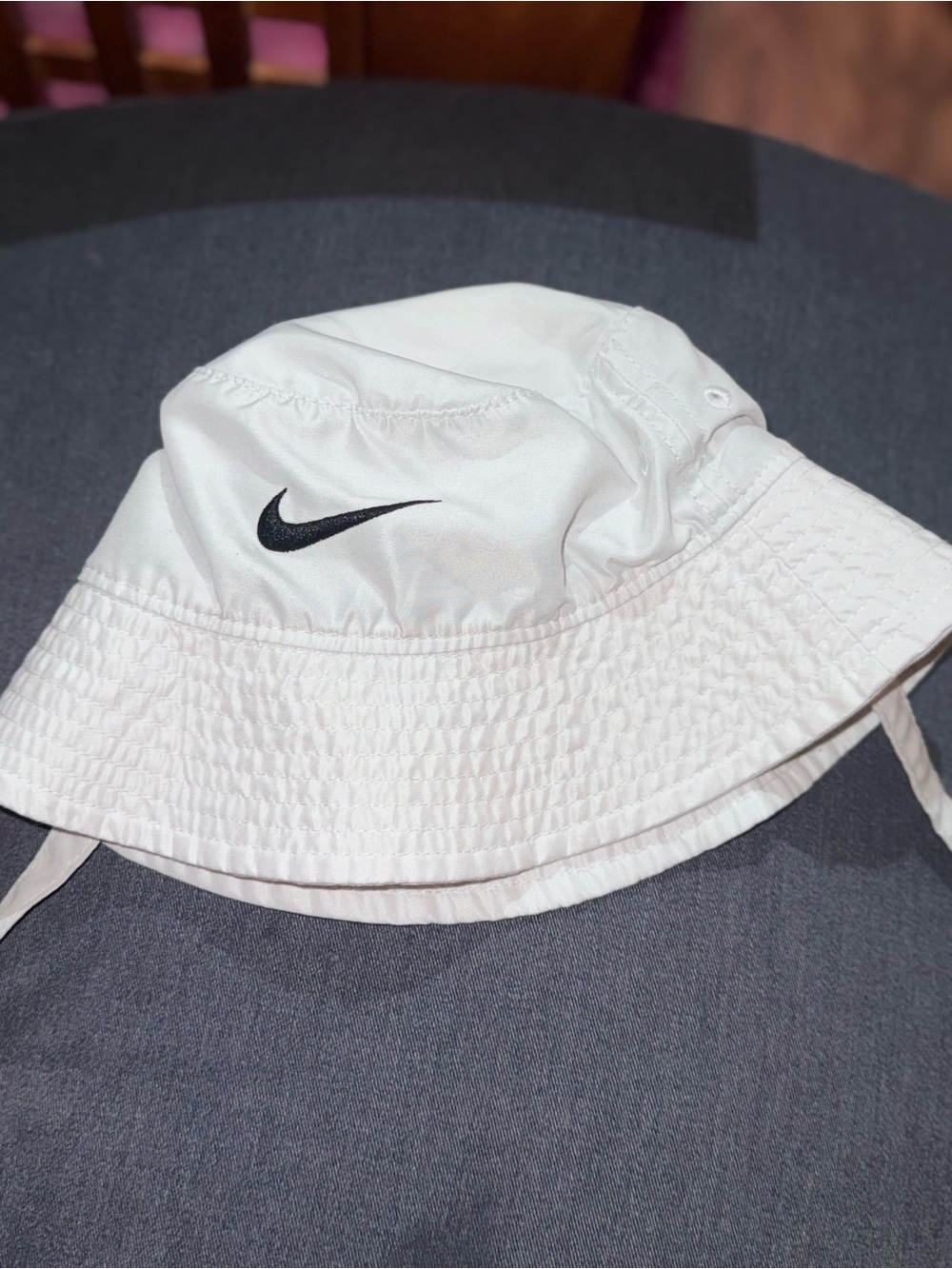 Nike Kids White Bucket Hat with Black Swoosh Logo and Chin Straps